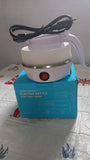 Portable electric kettle with collapsible silicone body